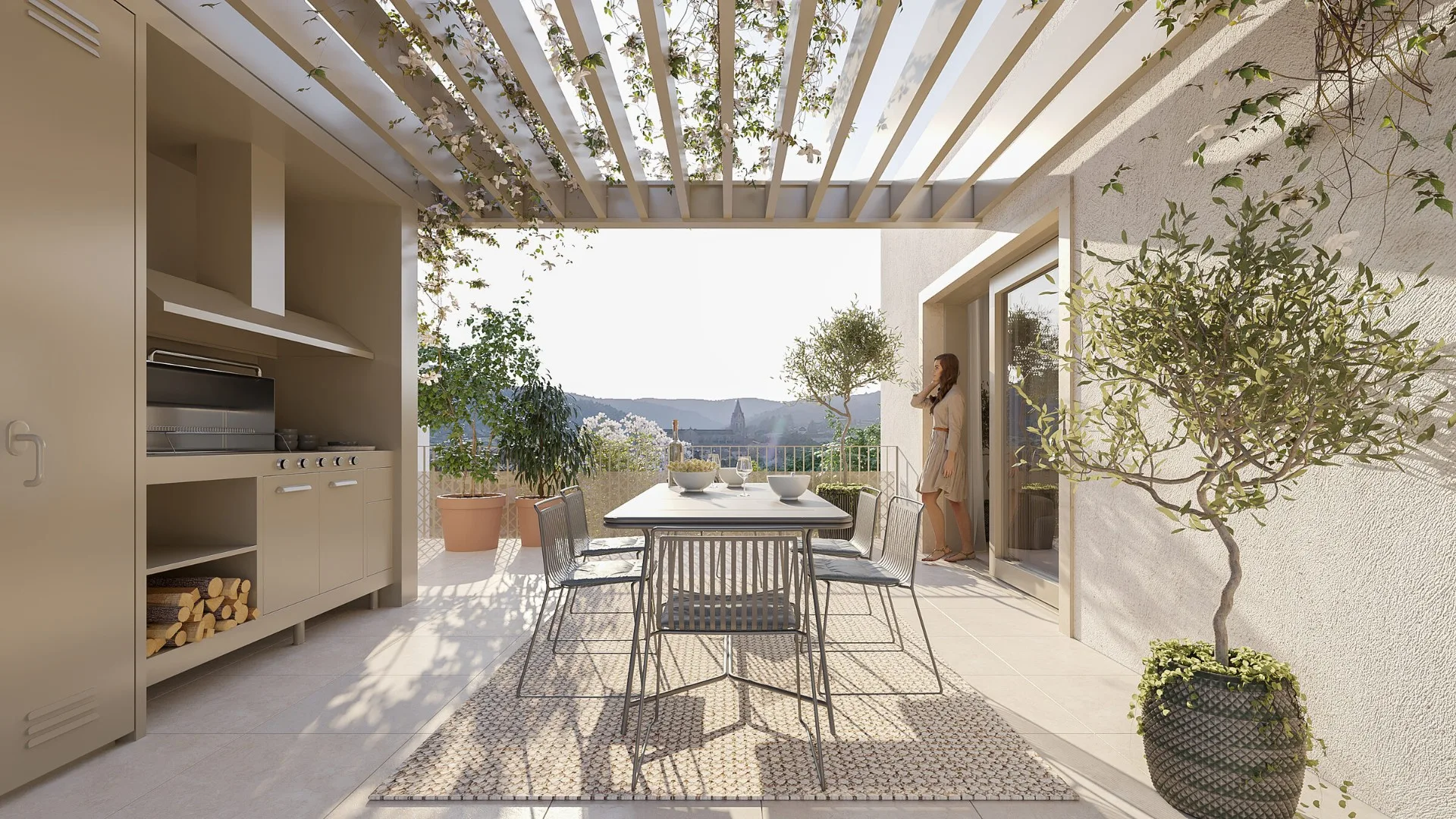 Cuisine d'été sous pergola fleurie, vue sur le clocher de Renaison